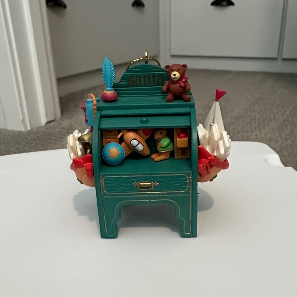 Santa's Best Christmas Charmers "Santa's Desk" 1st Edition ornament from 1992.